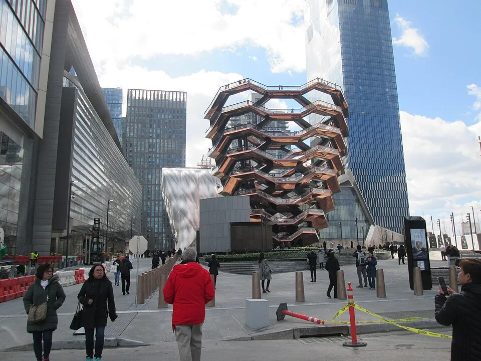 The Vessel and the glass towers of Hudson Yards seen from West 33rd Street